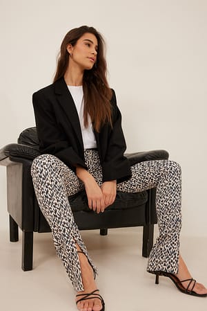 Print Smala jeans med slits fram