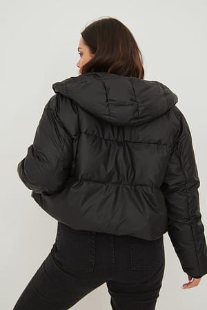 Black Gevoerde jas met coating en capuchon