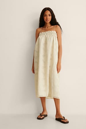 Sand Blommig midiklänning i jacquard