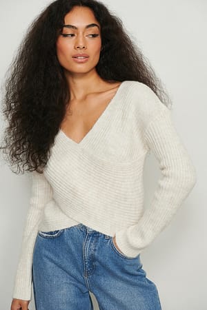 White Pull cache-cœur en tricot