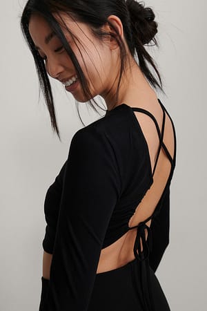 Black Top met knoop aan de achterkant