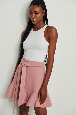Pink Gerecyclede rok met strikceintuur en volant