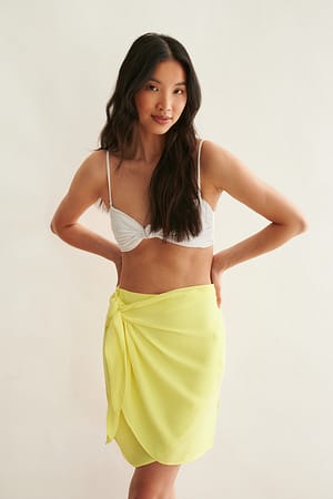Yellow Mini rok met sarong strik