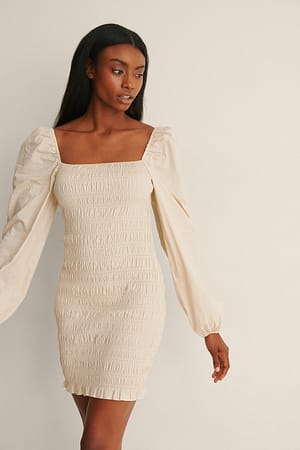 Beige Robe mini en coton à smocks
