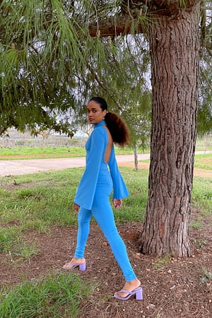 Blue Jumpsuit met open rug