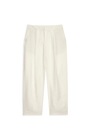 Beige zulaufende Leinenhose mit mittlerer Taille