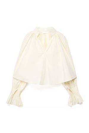 Offwhite V-ringad blus