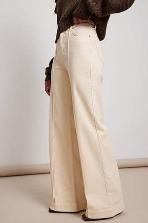 Beige Jeans met wijde pijpen