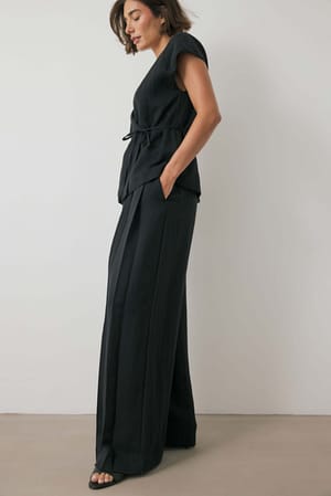 Black weite Lyocell Plissee-Hose