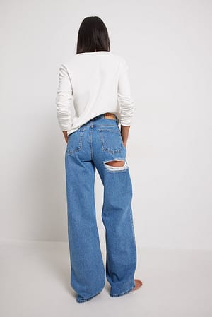 Mid Blue Jeans mit hinteren Details
