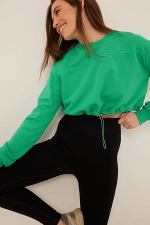 Green Crop-Sweatshirt mit Kordelzugdetail