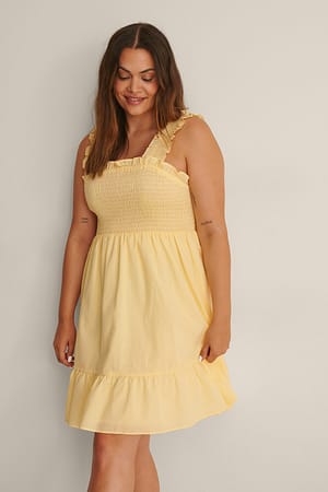 Light Yellow Gesmokte mini-jurk met ruches