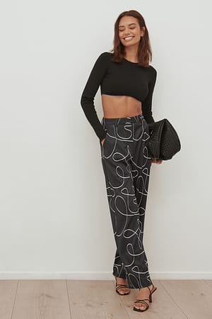 Black Swirl Print Printede bukser med vide ben