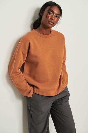 Orange Rust Bio-Pullover mit weiten Ärmeln