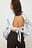 Blouse met ballonmouwen en open rug