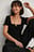 Ekologisk babylock croppad topp