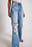 Jeans med vida ben och slitna detaljer