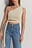 Top met knoopdetail met one-shoulder