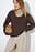 Strikket sweater i uldblanding med dyb hals