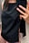 Top met boothals en strikdetail