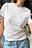 Camiseta de algodón con cuello redondo