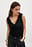 Top de malla con volantes