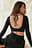 Top met glitters en open rug