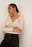 Gerecycleerd glanzende top met ruchesluiting