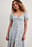 Chiffon midi-jurk met knopen aan de voorkant