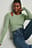 Pull tricoté clair à découpes