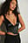 Ingerimpelde korset top