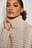 Hochgeschnittener Chunky Strickpullover