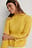 Pull tricoté à détail laçage