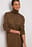 Langes, hochgeschlossenes Strickkleid mit Schlitz