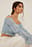 Gerecycleerde off-shoulder blouse