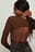 Body met open rug