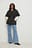 Gevoerde poncho met riem