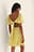 Robe Courte Ruchée Avec Dos Ouvert Noué Et Manches Bouffantes