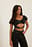Glanzende top met ruches en bandjes