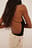 Bodystocking med dyp hals og spaghettistropper