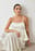 Top peplum con espalda abierta y tirantes