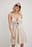 Vestido mini con lazo frontal y tirantes