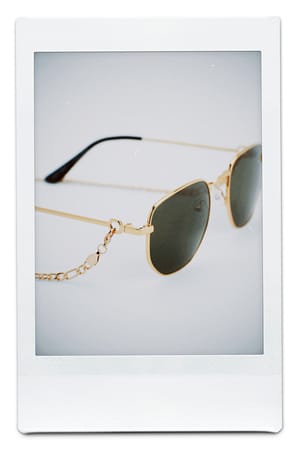 Gold Resirkulerte metallsolbriller med og lenkedetaljer