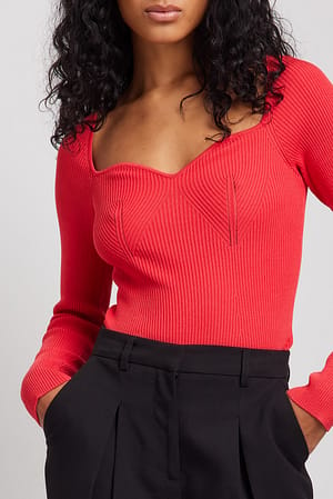 Red Strikket sweater med lange ærmer og detalje på bryst