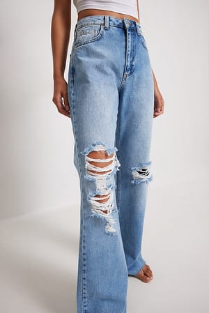Light Blue Jeans wide leg com aspeto desgastado