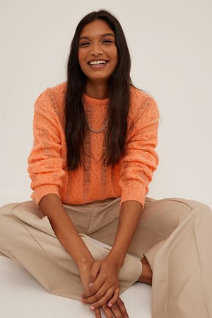 Light Orange Strikket sweater med huller