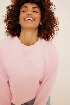 Pink Sweater med printdetalje