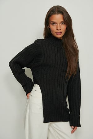 Black Asymmetrisk strikket ribbet sweater