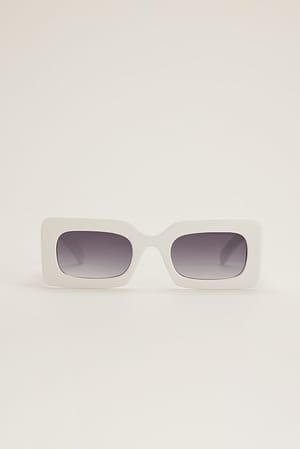 White Solglasögon med stora chunky bågar