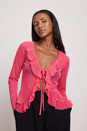 Pink Skjorta med volangdetaljer och knytning framtill